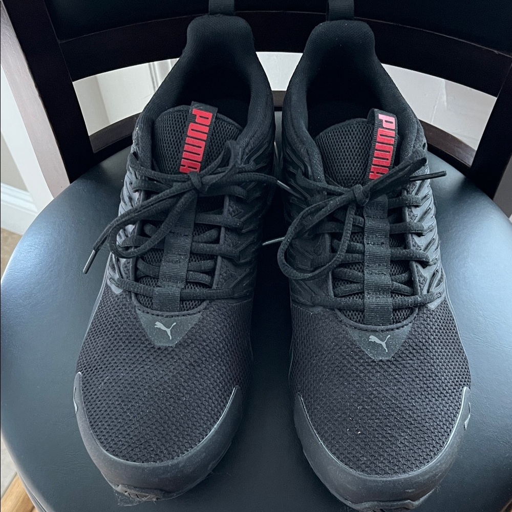 PUMA Black Athletic Shoes with Red Accents